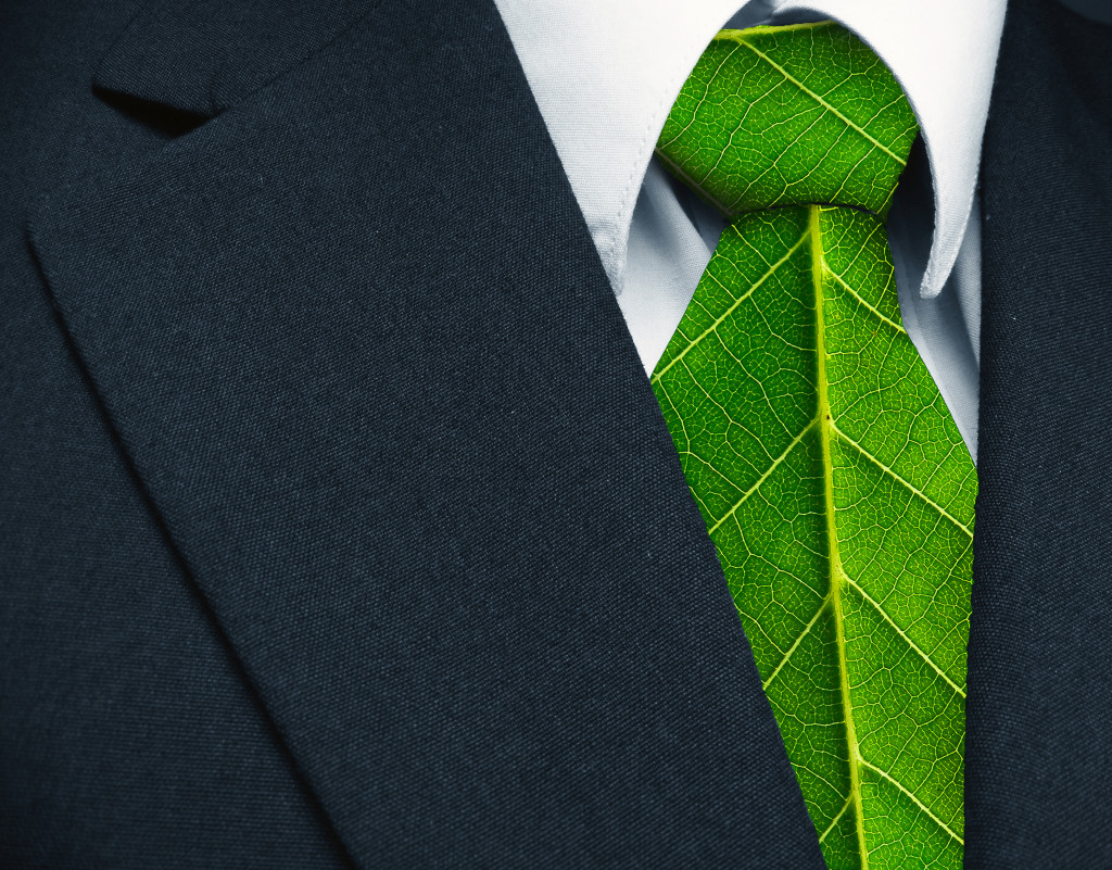 businessman wearing suit with a leaf-styled necktie